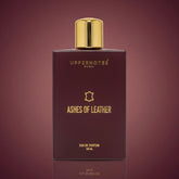 Perfume bottle labeled 'Ashes of Leather' by Uppernotes on a dark red background