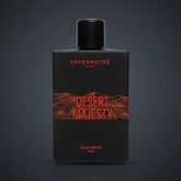 Black perfume bottle labeled 'Desert Majesty' by Uppernotes on a dark background