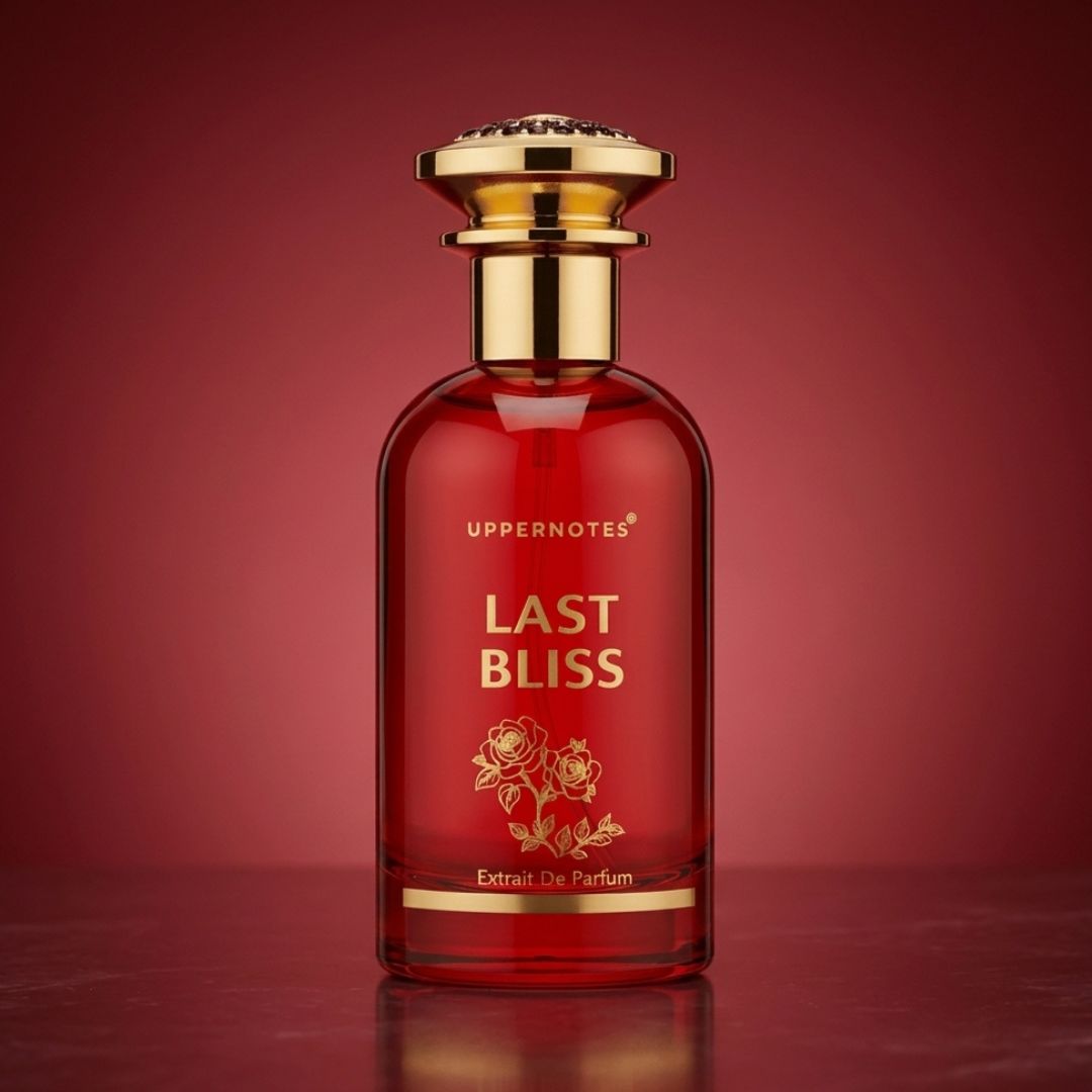 Red perfume bottle labeled 'Last Bliss' with gold accents on a red background