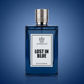 Blue perfume bottle labeled 'Lost in Blue' by Uppernotes on a blue background