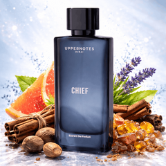 Perfume bottle labeled 'Chief' by Undernotes with spices and fruits on a light blue background