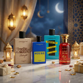 Collection of Uppernotes perfume bottles with decorative lanterns and gift boxes on a table.