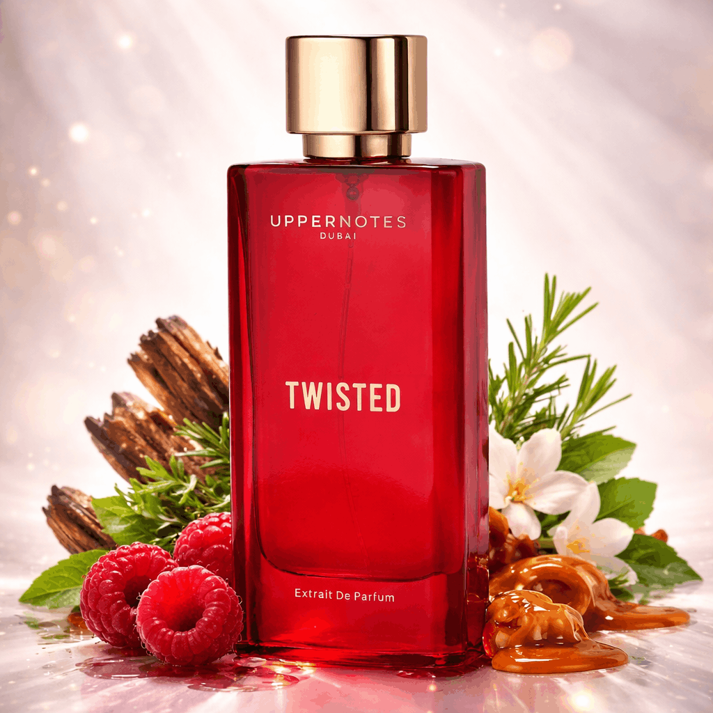 Red perfume bottle labeled 'Twisted' with decorative elements on a reflective surface.