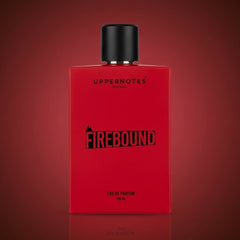 Red perfume bottle with black cap on a red background